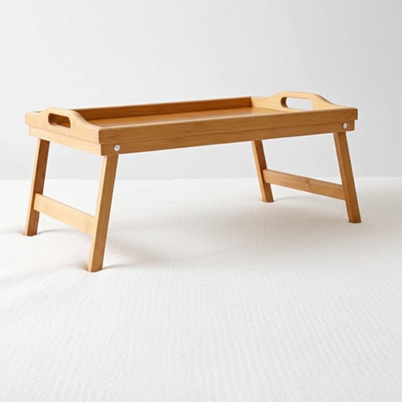 عام صينية سرير من خشب البامبو قابلة للطي متعددة الاستخدامات مناسبة لتقديم الإفطار أو القهوة أو استخدامها كطاولة لابتوب

تصميم عصري وعملي مزودة بأرجل قابلة للطي لتوفير المساحة وسهولة التخزين

مصنوعة من خشب بامبو عالي الجودة ومتين للاستخدام اليومي في المنزل أو على السرير أو في الحديقة بلون خشبي طبيعي أنيق - Image 1